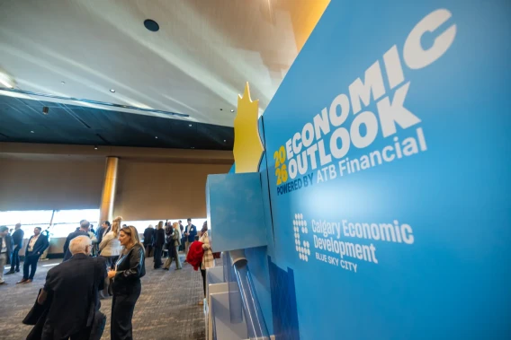 Attendees gathering beside signage for the 2026 Economic Outlook event powered by ATB Financial and Calgary Economic Development.